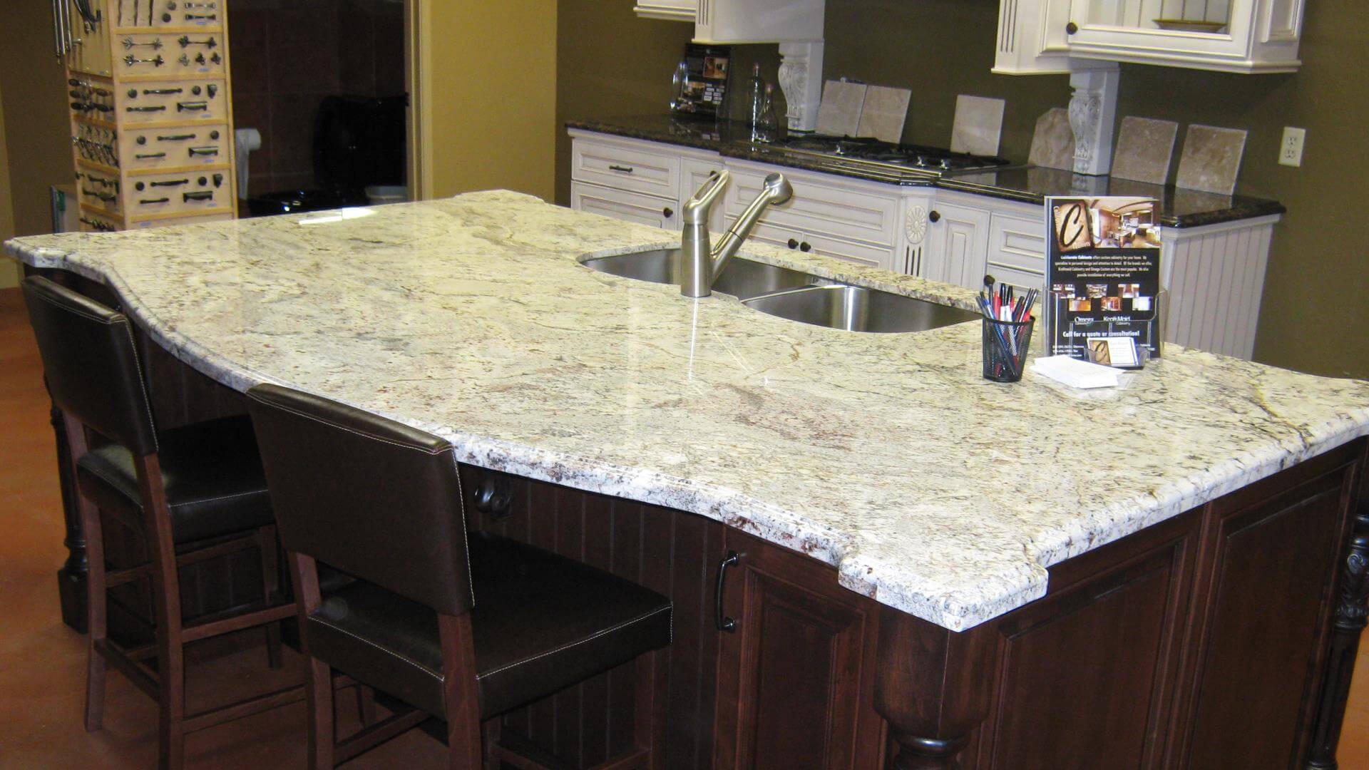Granite island in the California Cabinets showroom